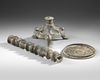 A KHORASAN COMPOSITE BRONZE LAMP STAND, PERSIA, 12TH CENTURY