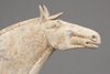 A PAIR OF LARGE CHINESE POTTERY TANG HORSES
