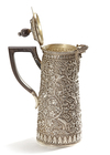 AN INDIAN SILVER JUG WITH WOODEN HANDLE, 19TH CENTURY