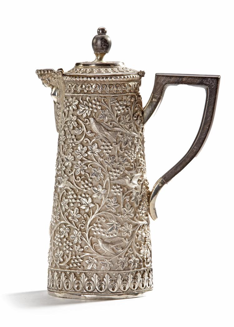 AN INDIAN SILVER JUG WITH WOODEN HANDLE, 19TH CENTURY
