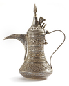 A SILVER COFFEE POT OR DALLAH, OMAN NIZWA, CIRCA 1930-1950