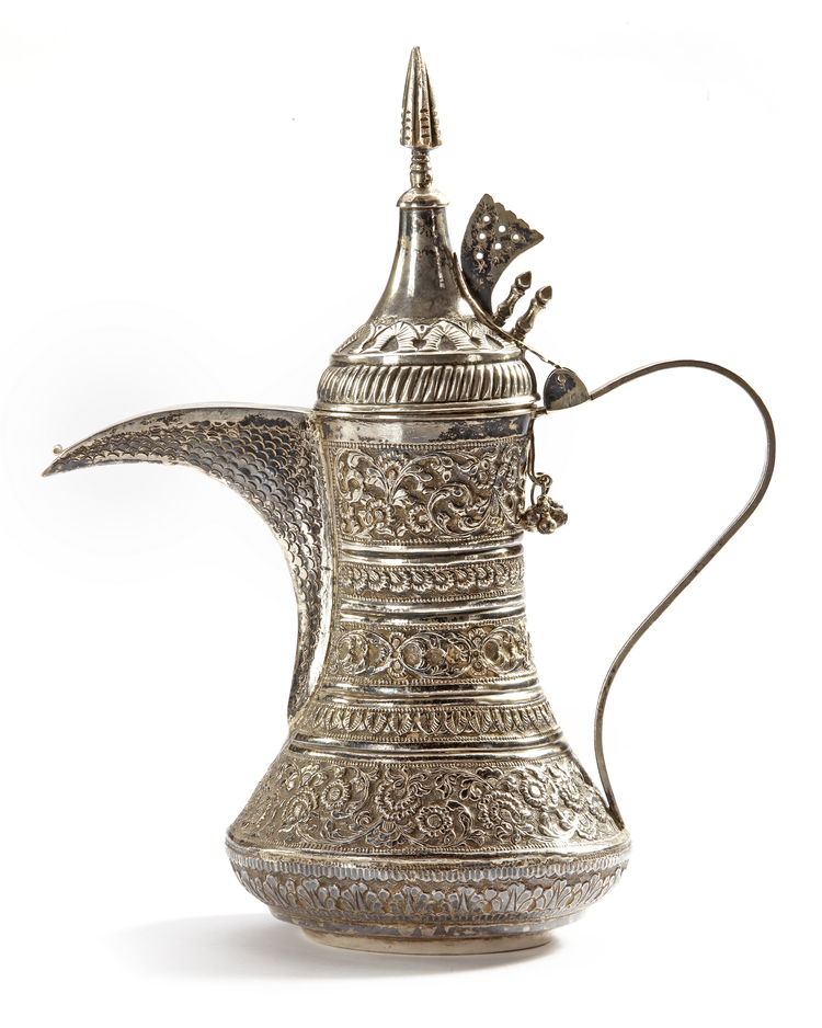 A SILVER COFFEE POT OR DALLAH, OMAN NIZWA, CIRCA 1930-1950