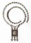 A SILVER NECKLACE  DEPICTING MARIA, IRAQ, 19TH CENTURY
