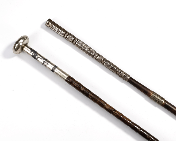 TWO SILVER-MOUNTED CANES, IRAQ, 20TH CENTURY