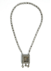 A SILVER NECKLACE DEPICTING MARIA AND CHILD, IRAQ, 19TH CENTURY