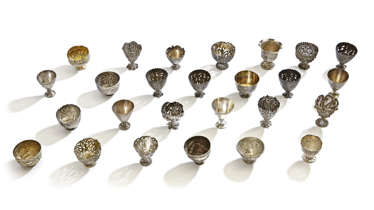 AN OTTOMAN COLLECTION OF TWENTY-SIX SILVER CUPHOLDERS, 19TH CENTURY