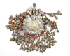 A SILVER UZBEK PARKHONA PENDANT, 19TH CENTURY