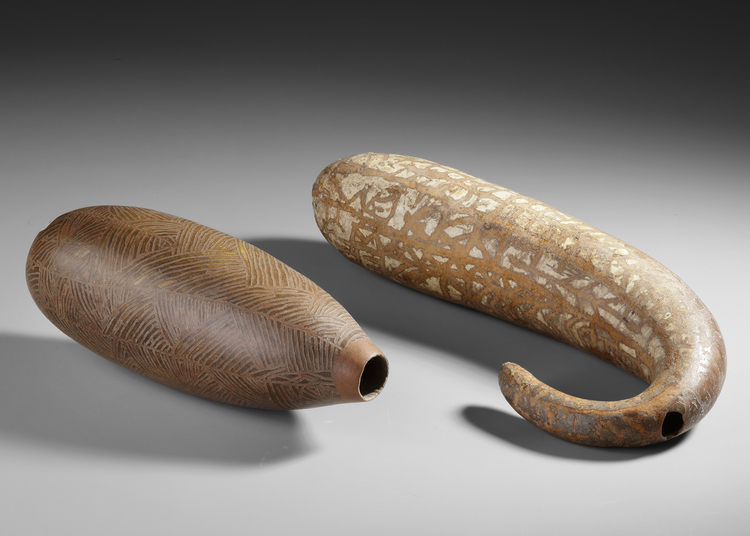 Two large gourd water containers from the Baliem valley (Dani)