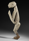 Asmat ancestor carving in heavy wood.