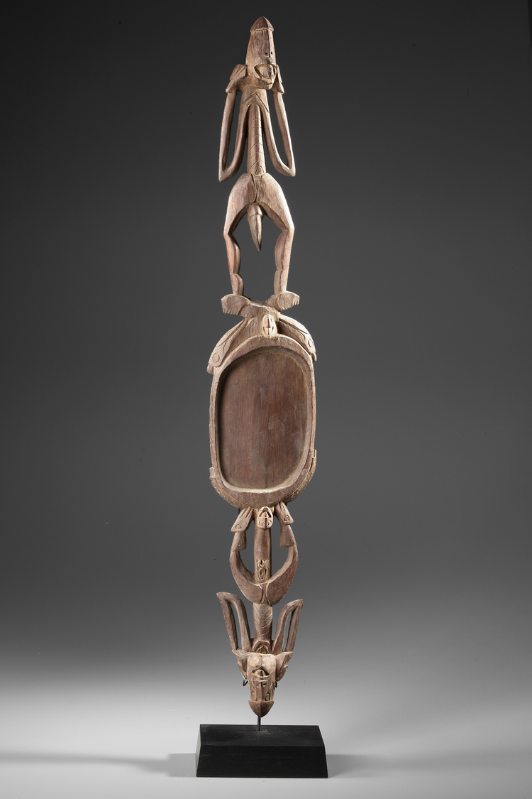 Asmat ceremonial dish with two ancestor figures. One male and one female. Collected by Jac Hoogerbrugge in the 1960’s or 1970’s. On a custom made stand.