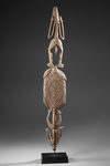 Asmat ceremonial dish with two ancestor figures. One male and one female. Collected by Jac Hoogerbrugge in the 1960’s or 1970’s. On a custom made stand.