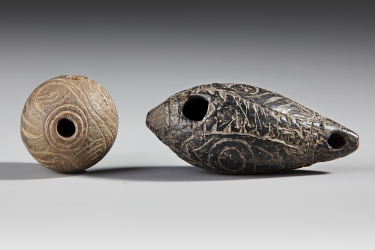 Two whistles made from nuts. Provenance: Jolika Collection of John and Marcia Friede.