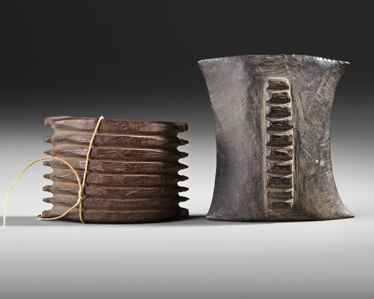Two wooden wristbands/bracelets from the north coast, used for protection when shooting a bow. Collected by Jac Hoogerbrugge before 1969. See the Hoogerbrugge collection note.
