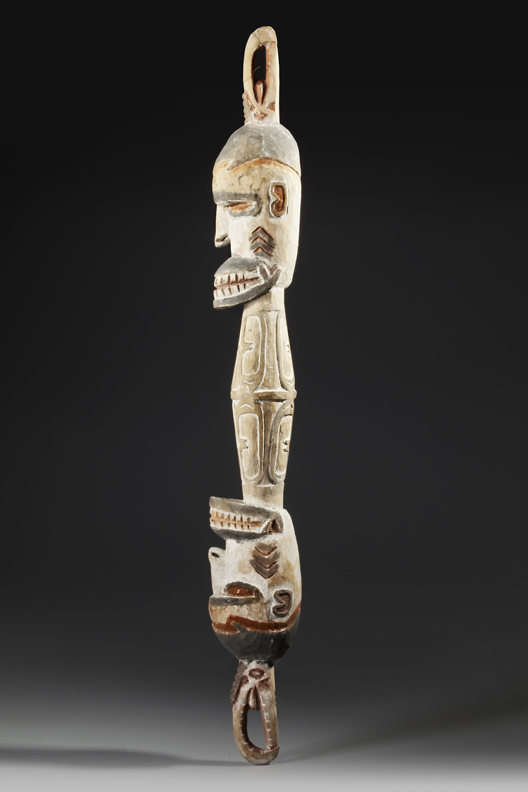 Asmat carving in the form of a neckrest with beautifull natural colors. Collected by Jac Hoogerbruge  See the in situ foto.
