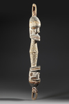 Asmat carving in the form of a neckrest with beautifull natural colors. Collected by Jac Hoogerbruge  See the in situ foto.