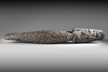 Large Asmat neckroll with ancestor heads, praying mantis and other headhunting motifs.