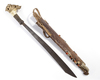 Dayak Mandau. Decorated with bone panels and fur. From the collection of Jac Hoogerbrugge.