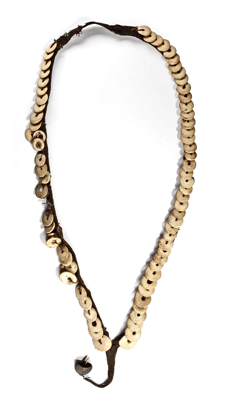 A very long brides price necklace from the Boiken people in the Prince Alexander Mountains East Sepik. 120 cm long. Provenance: Ulrich Kortmann Dortmund