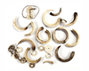 Asmat bracelet consisting of two boar tusks, collected by Jac Hoogerbrugge before 1969.