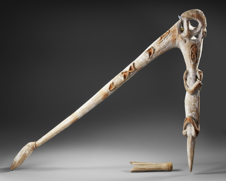 Large sago beater decorated with turtle and praying mantis motif.  Collected by Jac Hoogerbrugge before 1969.