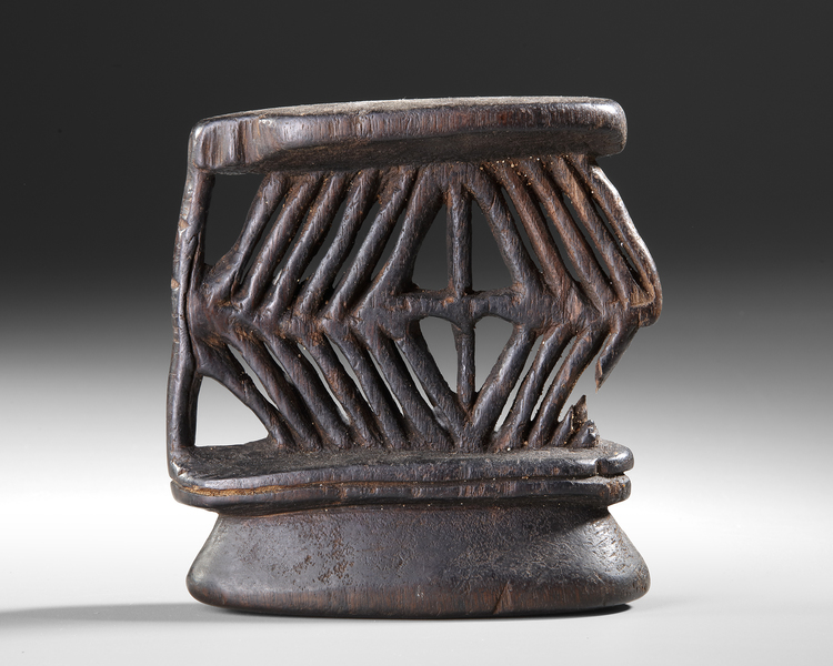 Ancient Collingwood Bay headrest. The missing piece ssems to have been missing for a very long time
