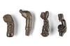 Four kris, machete, sword or betel nut crusher handles. Collected by Jac Hoogerbrugge in the 1960’s and 1970’s.