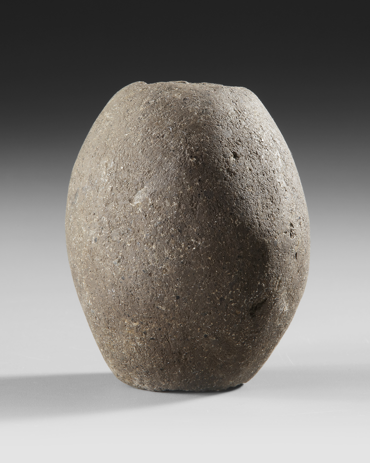 Marind Anim stone mace head.