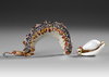 Two Kula gifts. Decorated shells from the Kula ring in South East Papua.