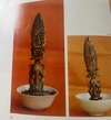 Borneo Dayak Hampatong figure in a 19th century copy of a Song bowl.