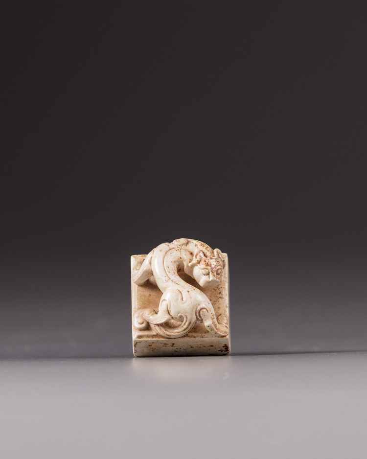 A Chinese chicken bone jade square seal