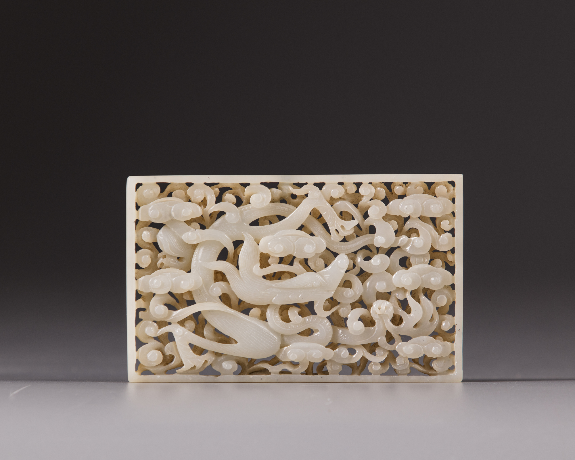 A white jade openwork ‘dragon’ plaque