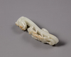 A Chinese pale celadon jade 'dragon and chilong' belt hook