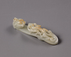 A Chinese pale celadon jade 'dragon and chilong' belt hook