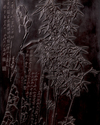 A Chinese black-lacquered wood inscribed 'bamboo and rocks' panel