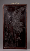 A Chinese black-lacquered wood inscribed 'bamboo and rocks' panel