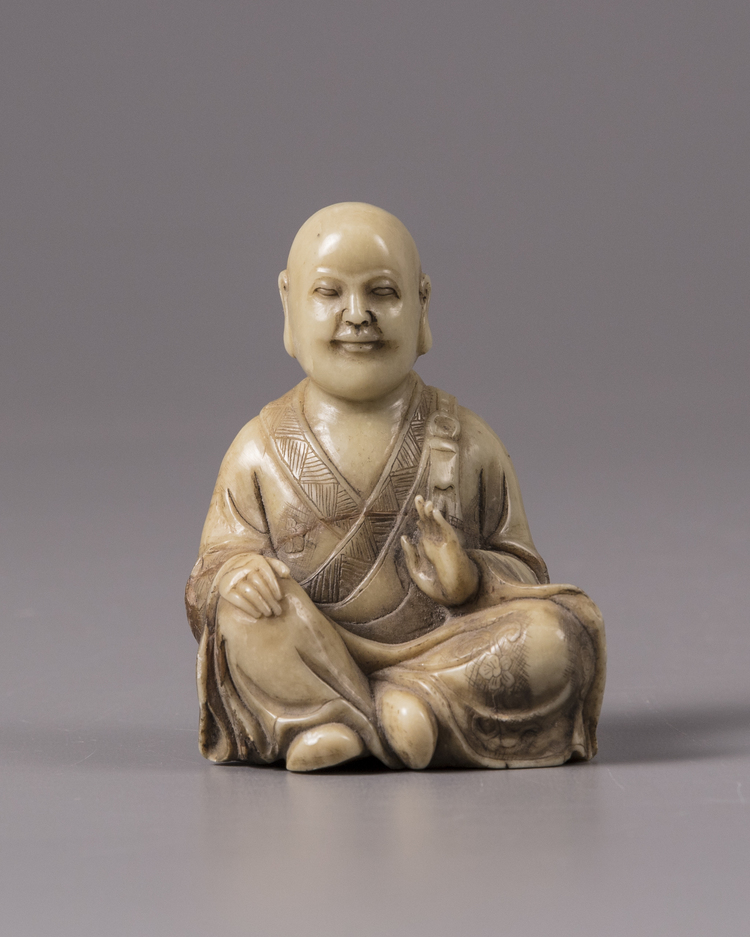 A CHINESE SOAPSTONE FIGURE ,19TH CENTURY