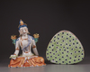 A Chinese famille rose figure of Avalokitesvara on a double lotus base