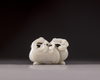 A Chinese white jade carving of a pair of cranes