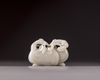 A Chinese white jade carving of a pair of cranes