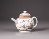 A Chinese Dutch-decorated carved-surface 'three friends of winter' teapot