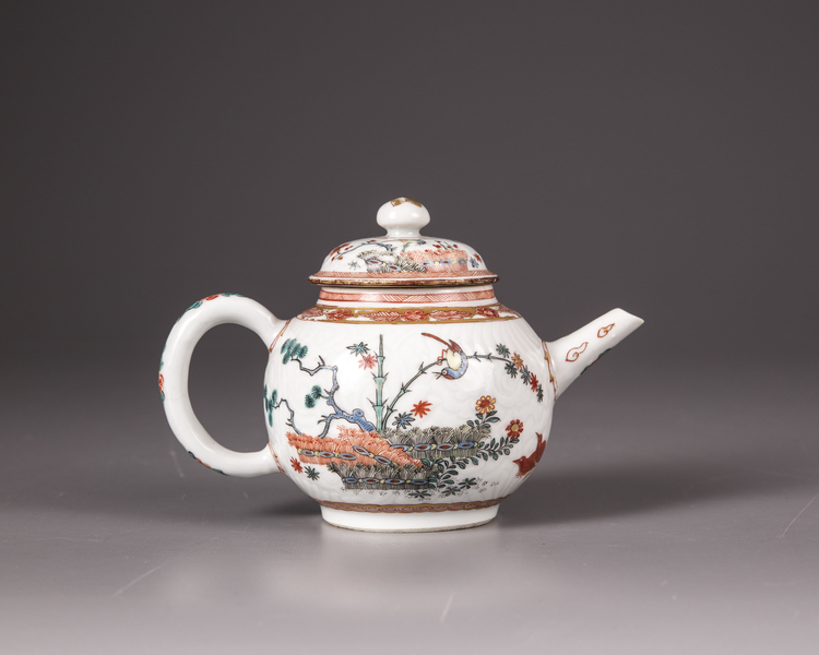 A Chinese Dutch-decorated carved-surface 'three friends of winter' teapot