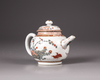 A Chinese Dutch-decorated carved-surface 'three friends of winter' teapot