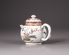 A Chinese Dutch-decorated carved-surface 'three friends of winter' teapot