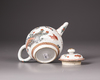 A Chinese Dutch-decorated carved-surface 'three friends of winter' teapot