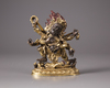 A Sino-Tibetan gilt bronze figure of Sadbhuja Mahakala