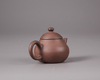 A Chinese yixing teapot and cover