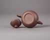 A Chinese yixing teapot and cover