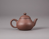 A Chinese yixing teapot and cover