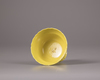 A Chinese yellow glazed stem cup