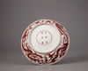 A Chinese iron-red-decorated 'dragon' dish